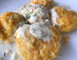 Kürbisnockerl mit Sahnesauce und Parmesan